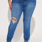 Distressed Buttoned Jeans with Pockets