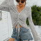 Openwork Drawstring Flare Sleeve Sweater