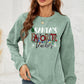 SANTA'S FAVORITE TEACHER Graphic Sweatshirt